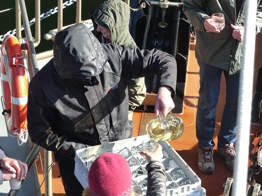Sharing the tannin-stained, forest-filtered water collected at the bow of the Fiordland Navigator, Nov 2015